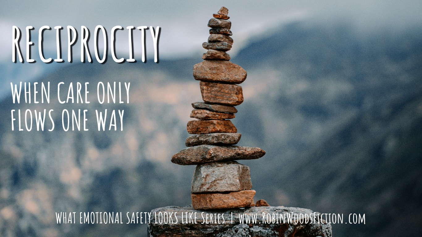 Precariously balanced stones representing one-sided care and reciprocity in relationships